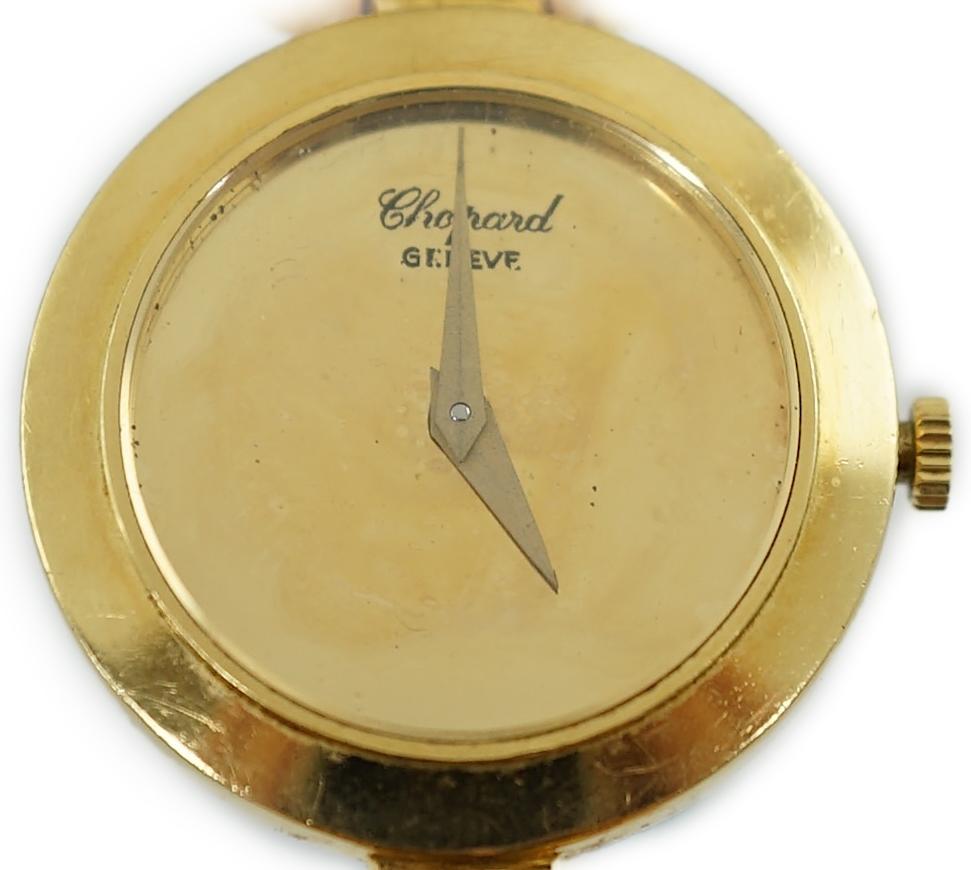 A lady's 18k gold Swiss Chopard manual wind hinged bangle wrist watch